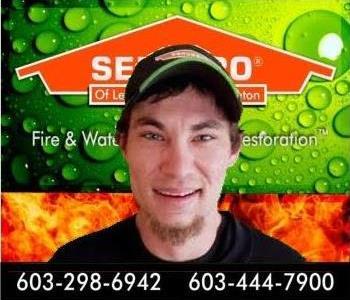 head shot of man in front of SERVPRO background