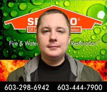 head shot of man in front of SERVPRO background